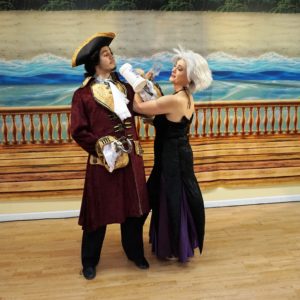 A toast Captian Hook and Ursula